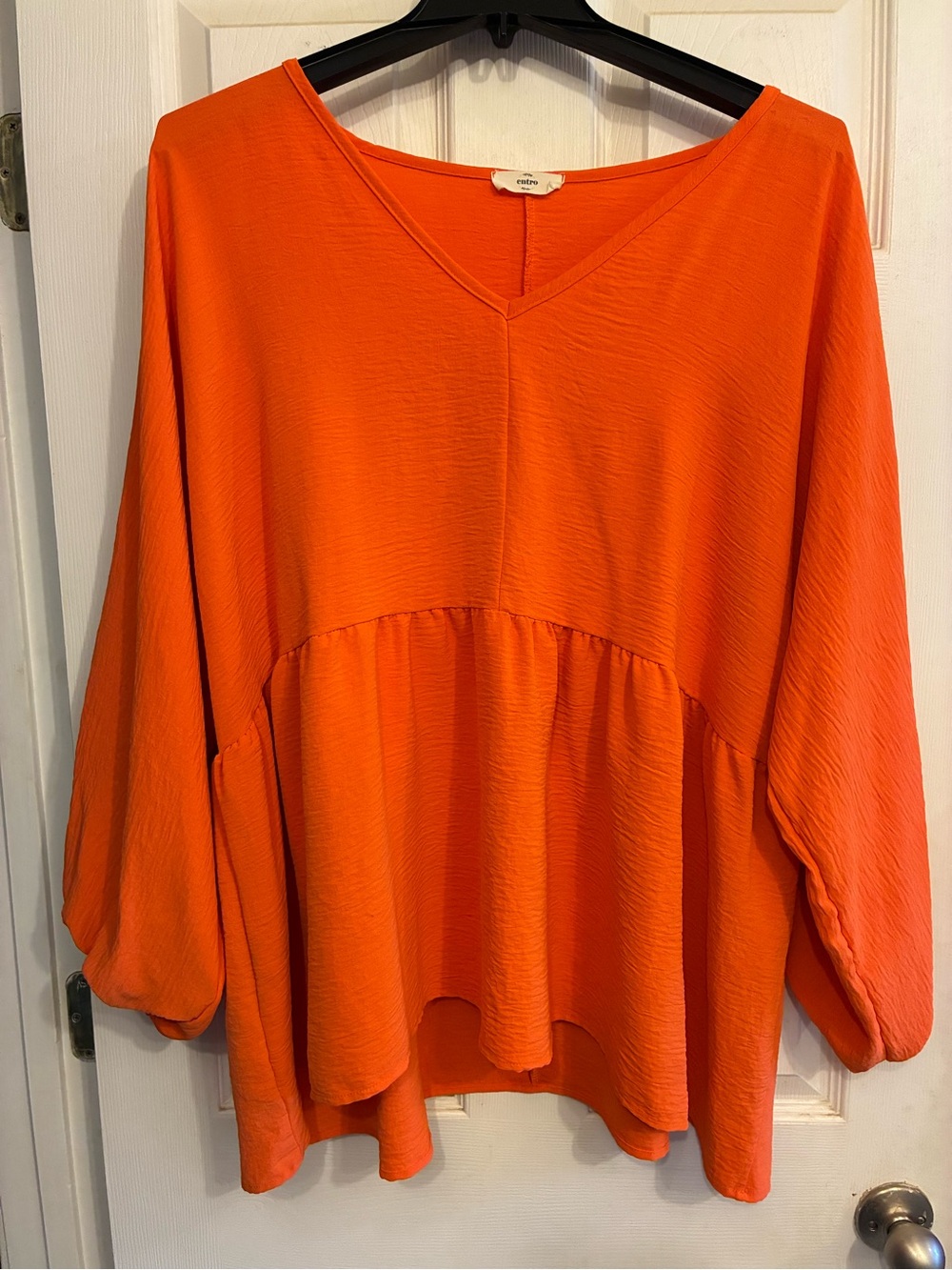 Orange top.